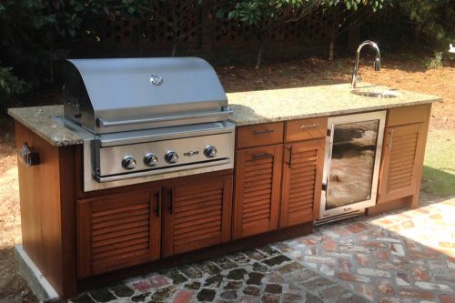 NatureKast outdoor summer kitchen cabinets in Melbourne FL. Cabinet installation by Hammand Kitchens & Bath